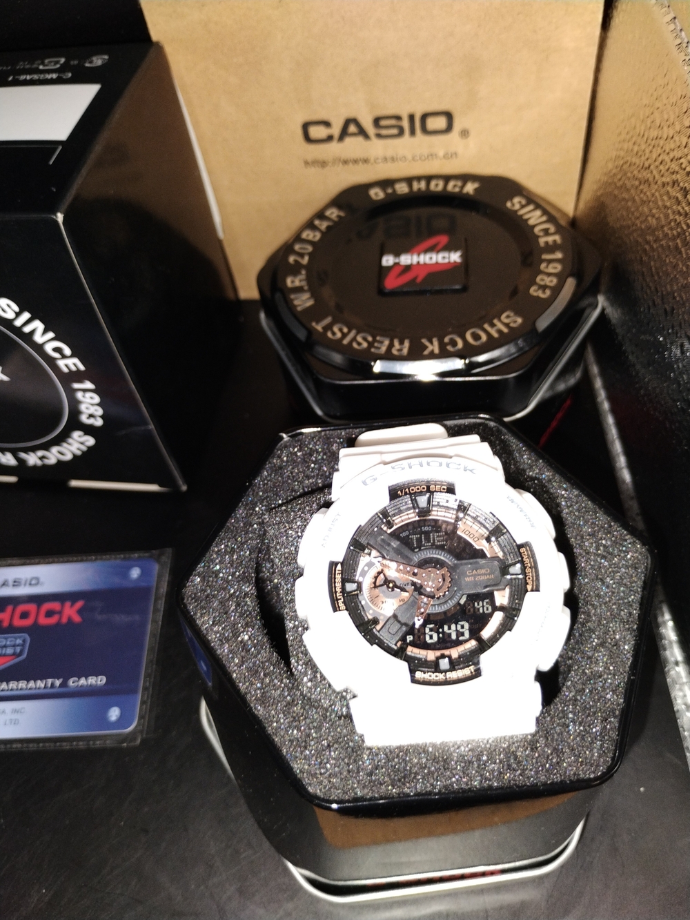 Casio G-Shock White and Black Resin Sport Watch with Gold Accents